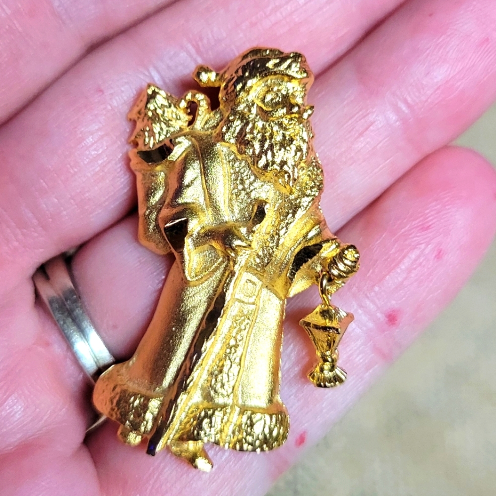 Vintage gold tone father Christmas brooch with a dangle lantern-goldtone